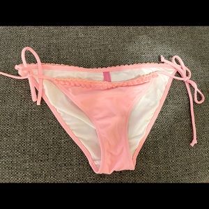 Pink Victoria’s Secret pom pom bikini bottoms